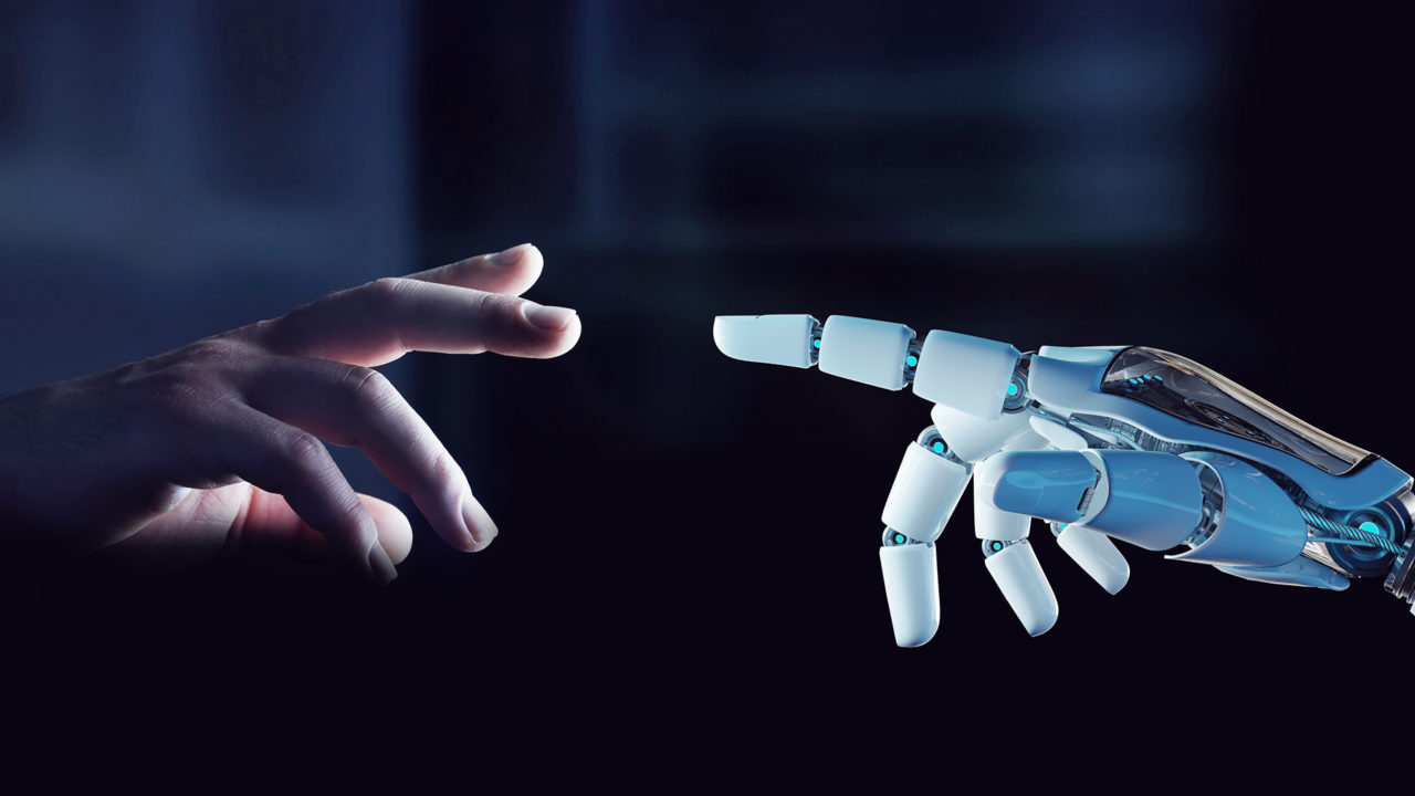 Human hand reaching to robot hand