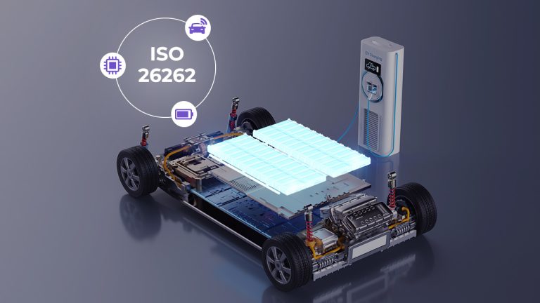 A digital rendering of an electric vehicle’s chassis showing battery cells, electric components, and wheels, next to a charging station. An ISO 26262 safety standard icon is highlighted beside the vehicle.