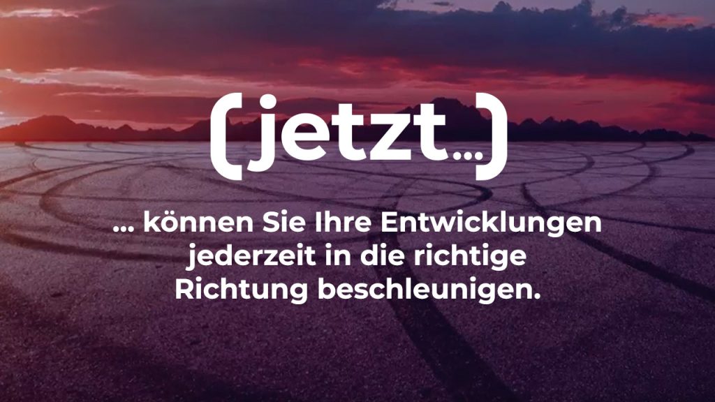 Dramatic sunset over a landscape with tire marks on the ground. Large white text reads "jetzt" and below in smaller text: "...können Sie Ihre Entwicklungen jederzeit in die richtige Richtung beschleunigen.