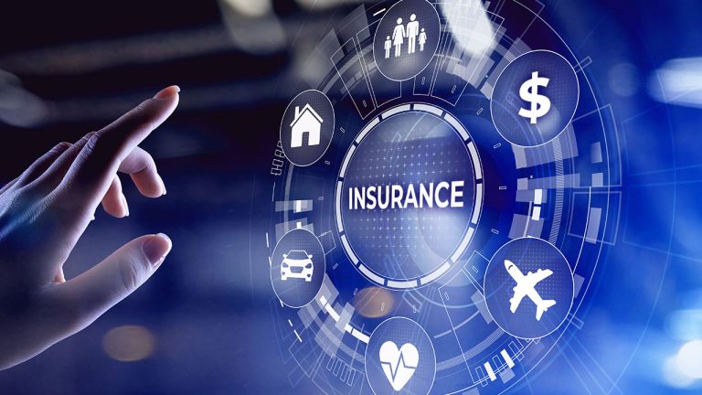 A hand reaches towards a digital interface displaying the word “INSURANCE” surrounded by icons for family, money, home, car, aeroplane, and heart, symbolising various types of insurance.