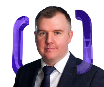 A man in a suit and tie positioned between two large purple brackets.