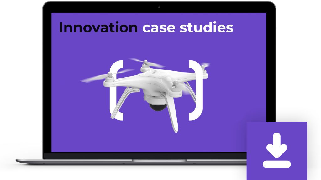 A laptop screen displaying an image of a white drone with four propellers, against a purple background with the text "Innovation case studies." A download icon is positioned in the bottom-right corner of the image.