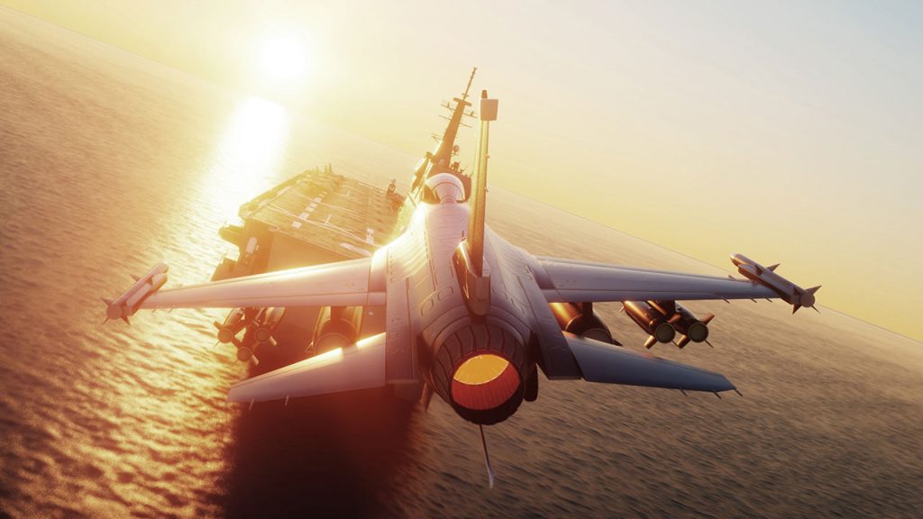 A jet fighter prepares to take off from an aircraft carrier at sea during sunset, with the sun low on the horizon and light reflecting off the water and the aircraft.