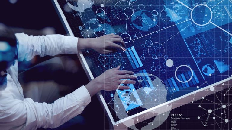 A person interacts with a futuristic digital touchscreen displaying various data analytics and global network graphics, in a dimly lit environment, emphasizing advanced technology and connectivity in business.