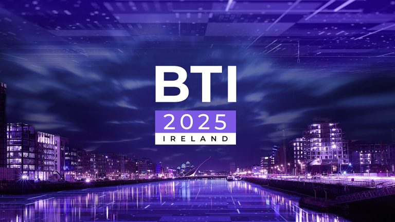 A futuristic cityscape of Ireland at night with glowing purple lights, overlaid with the text "BTI 2025 Ireland" in bold white and purple letters.