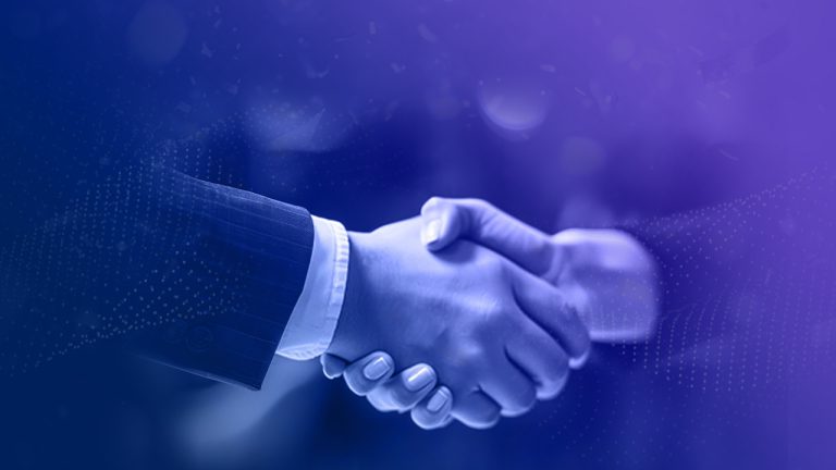 Two people wearing business attire shaking hands, set against a purple and blue gradient background. The image suggests a professional agreement or partnership.