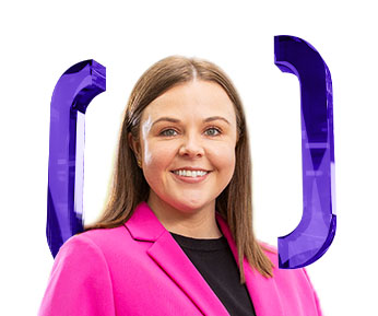 A woman with straight brown hair, wearing a bright pink blazer over a black top, smiles at the camera. Large, purple, translucent brackets are positioned behind her on a white background.