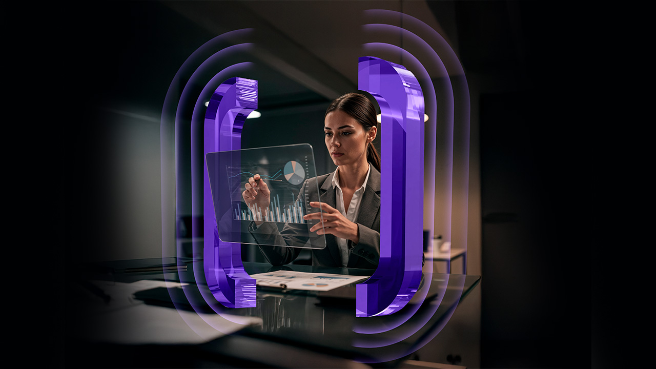 A woman in business attire interacts with a transparent virtual screen displaying charts and graphs, surrounded by glowing purple curved lines, in a modern office setting.