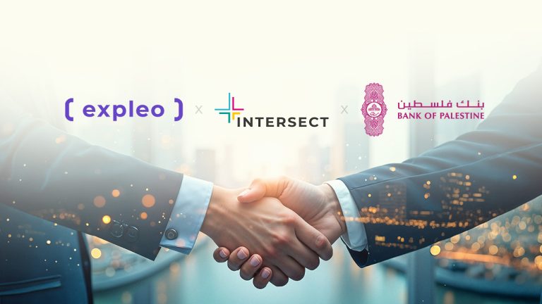 Two people in suits shake hands. Above them are logos for Expleo, Intersect, and Bank of Palestine, suggesting a partnership or agreement between the three organisations.