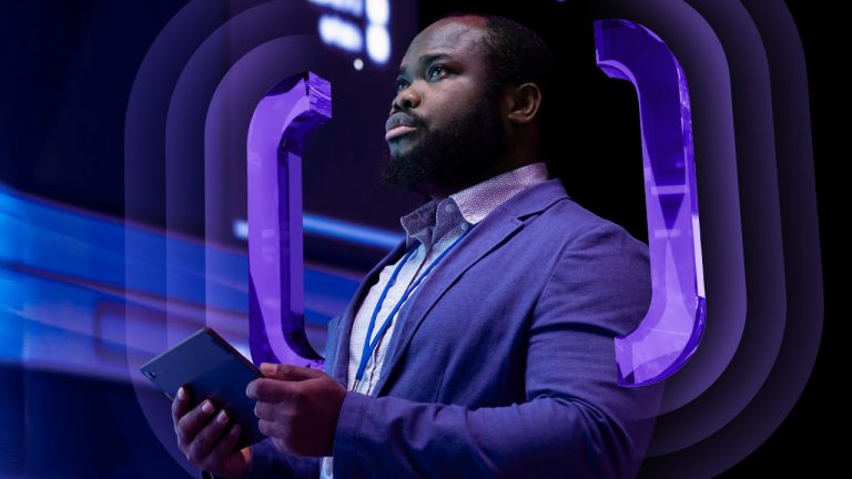 A man in a suit holding a tablet, framed by translucent purple digital brackets.
