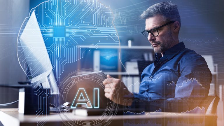 A man wearing glasses works at a computer, surrounded by digital overlays of a glowing brain, circuit patterns, financial charts, and an AI icon.