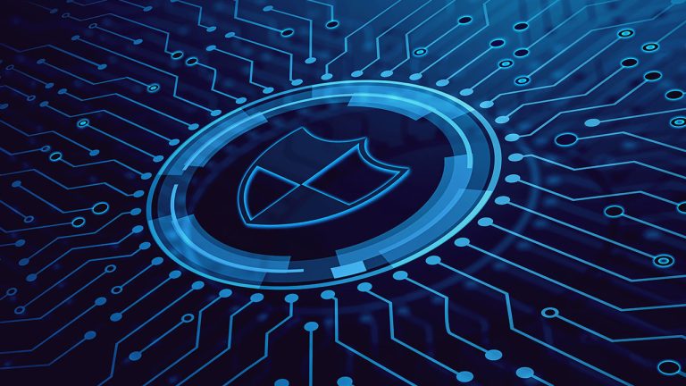 A glowing blue digital shield icon is centered on a dark circuit board background, symbolizing cybersecurity and data protection. Thin lines connect the shield to various circuit points, representing network security.